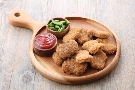 Photo for Fried chicken nuggets with ketchup and tomato sauce - Royalty Free Image