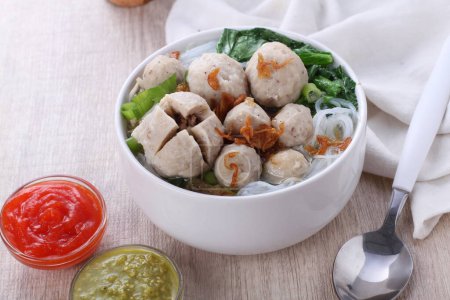 Photo for Chicken dumplings with sauce and vegetables - Royalty Free Image