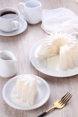 Photo for White and black tea cake with cream and sour sugar - Royalty Free Image