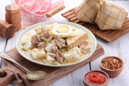 Photo for Lontong Sayur Padang is a food that is often eaten by Indonesians for breakfast - Royalty Free Image