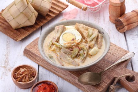 Photo for Lontong Sayur Padang is a food that is often eaten by Indonesians for breakfast - Royalty Free Image