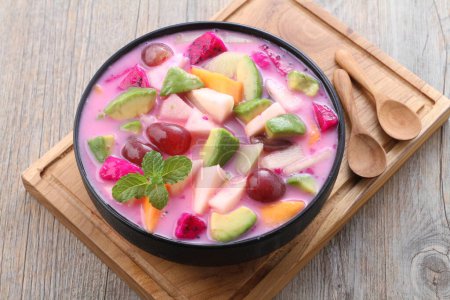 Photo for Fruit soup is a soup that is prepared using fruit as the main ingredient, and can be served cold, and is very popular during Ramadan, for takjil iftar. - Royalty Free Image