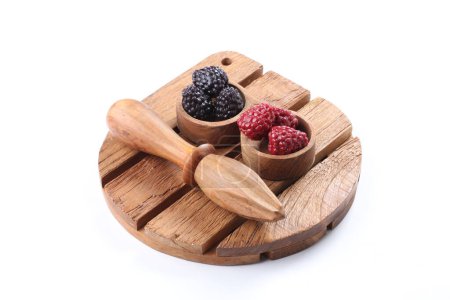 Photo for Fresh ripe berries in wooden bowl on white background - Royalty Free Image