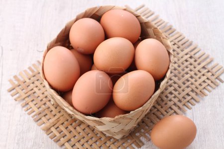 Photo for Egg raw on bright background - Royalty Free Image