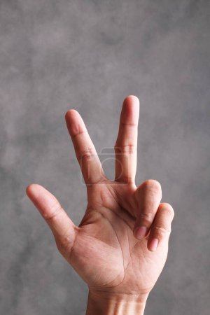 Photo for Close up of a hand of the boy's fingers on white background - Royalty Free Image