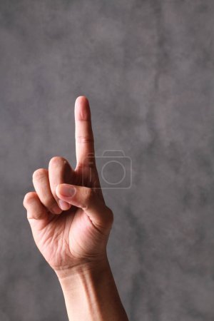 Photo for Hand of a man's hands showing a gesture of a finger - Royalty Free Image