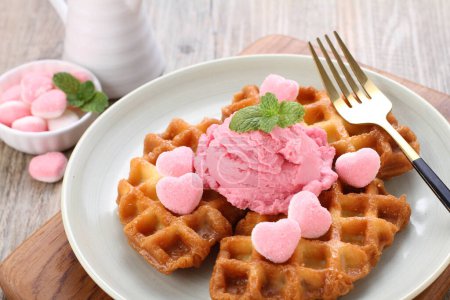 Photo for Delicious waffle with berries and ice cream on wooden table - Royalty Free Image
