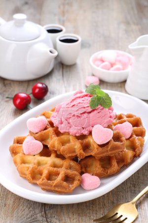 Photo for Delicious waffle with raspberries and chocolate on a plate - Royalty Free Image