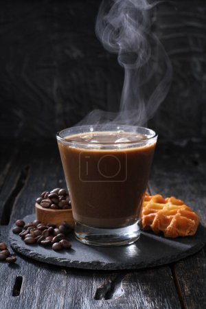 Photo for Coffee cup with chocolate and cinnamon on a wooden background - Royalty Free Image