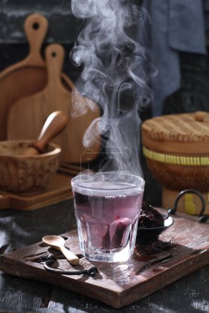 Photo for Chinese tea with ice and cinnamon sticks - Royalty Free Image