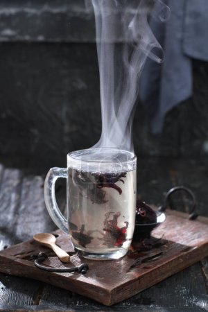 Photo for Cup of hot tea on a wooden background - Royalty Free Image