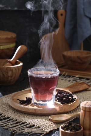 Photo for Black coffee in a cup and a glass of tea on a wooden background. - Royalty Free Image