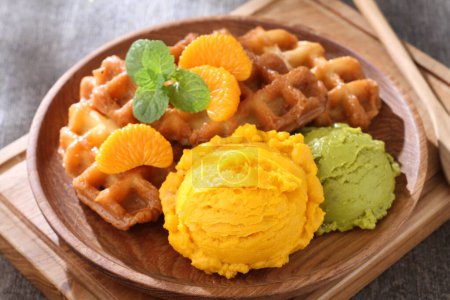 Photo for Homemade ice - cream with fruit, mango, kiwi and honey on wooden background. - Royalty Free Image