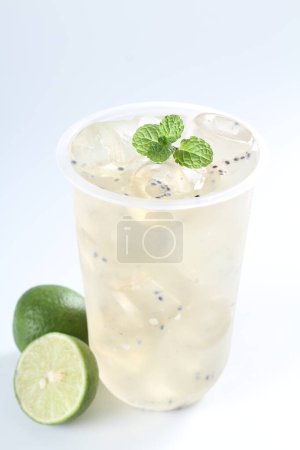 Photo for Fresh lemonade in glass on white - Royalty Free Image