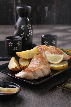 Photo for Fried salmon with lemon and ginger - Royalty Free Image