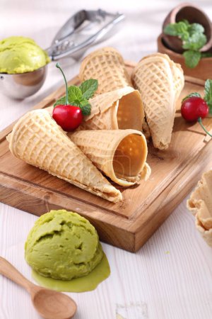 Photo for Waffle cone with ice cream and mint - Royalty Free Image