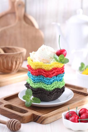 Photo for Rainbow dessert with chocolate and cream - Royalty Free Image