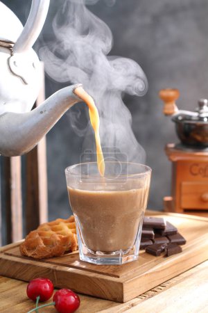 Photo for Cup of coffee with milk and croissant on the wooden table - Royalty Free Image