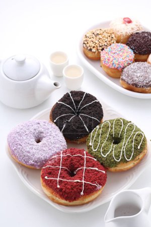 Photo for Colorful donuts in a dish - Royalty Free Image