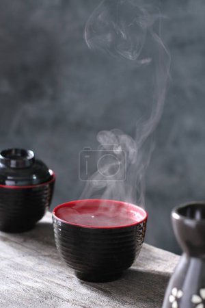 Photo for Cup of black coffee and teapot - Royalty Free Image