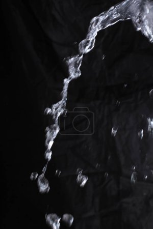 Photo for Water splash on black background - Royalty Free Image