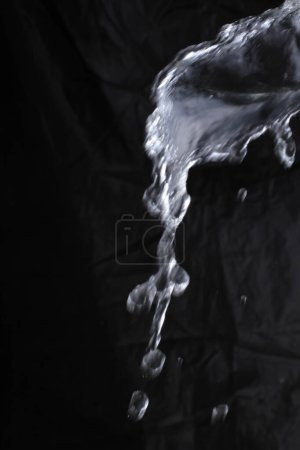 Photo for Black water splash on black background - Royalty Free Image