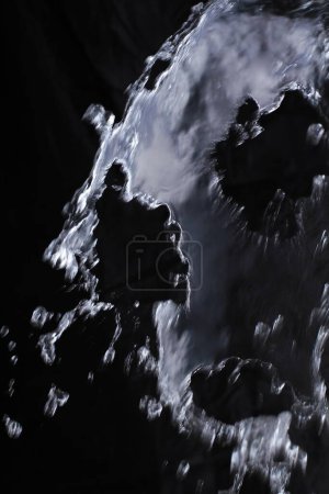 Photo for Water splashes on the black background - Royalty Free Image