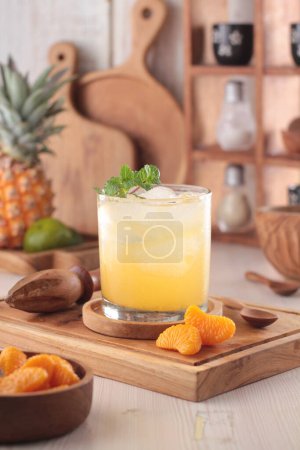 Photo for Fresh juice with orange and pineapple - Royalty Free Image