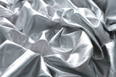 Téléchargez les photos : Texture de papier d'aluminium gris comme très beau fond, vue de dessus - en image libre de droit