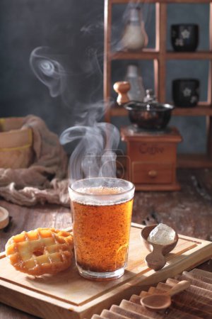 Photo for Hot tea on the table at autumn - Royalty Free Image