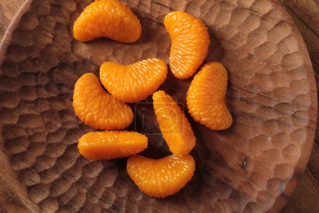 Photo for Fresh orange mandarin fruit on wood table - Royalty Free Image