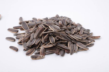 Photo for Pile of sunflower seeds isolated on white background - Royalty Free Image