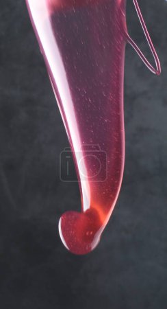Photo for Abstract 3 d render of liquid with red paint splashes - Royalty Free Image