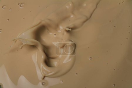 Foto de Chocolate Salpicadura de leche en la piscina de leche - Imagen libre de derechos