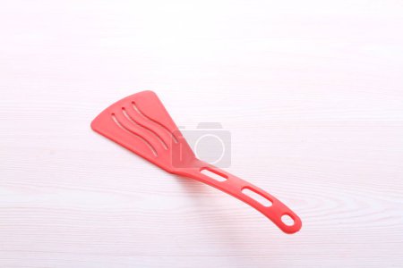 Photo for Pink kitchen ladle isolated on white background - Royalty Free Image