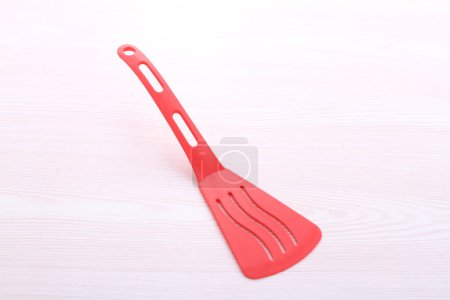 Photo for Red plastic spoon and fork - Royalty Free Image