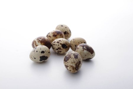 Photo for Quail eggs on a white background - Royalty Free Image