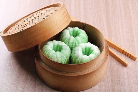 Photo for Green rice dumpling on wooden background - Royalty Free Image