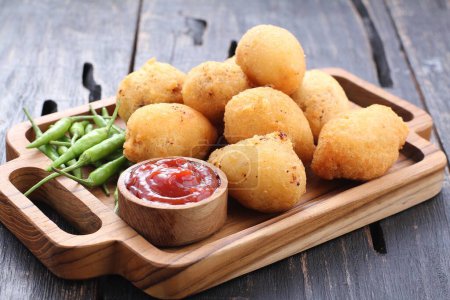 Photo for Fried potato balls with cheese - Royalty Free Image