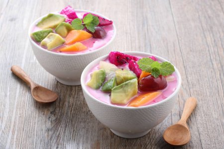 Photo for Fresh yogurt with watermelon, mint, kiwi and blueberry - Royalty Free Image