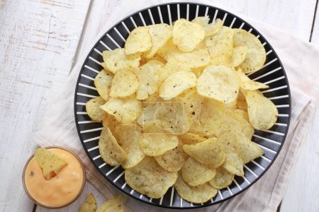 Photo for Potato chips on the plate - Royalty Free Image