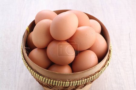 Photo for Fresh eggs in a basket - Royalty Free Image