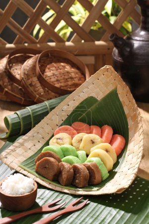 Photo for Indonesian traditional food called kuang, kuang ang or indonesian rice cake - Royalty Free Image