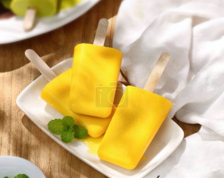 Photo for Ice cream popsicle on wooden background - Royalty Free Image