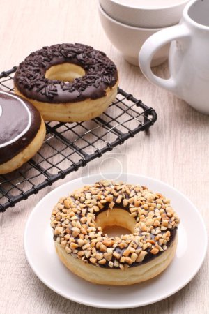 Téléchargez les photos : Donuts et tasse à café - en image libre de droit
