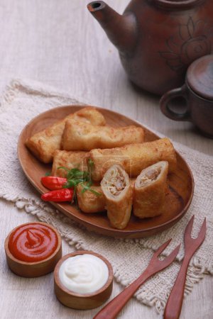 Photo for Fried spring rolls with sauce and vegetables - Royalty Free Image