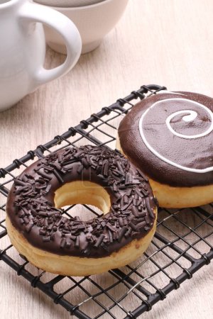Photo for Chocolate donut with cream and chocolate - Royalty Free Image