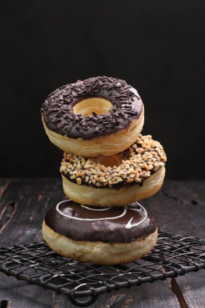 Photo for Donuts with chocolate glaze and icing - Royalty Free Image