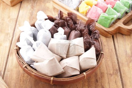 Photo for The term "dodol" believed as a word of Sundanese origin, which in Old Javanese also known as "dwadal", whereas in modern Javanese it is called jenang - Royalty Free Image