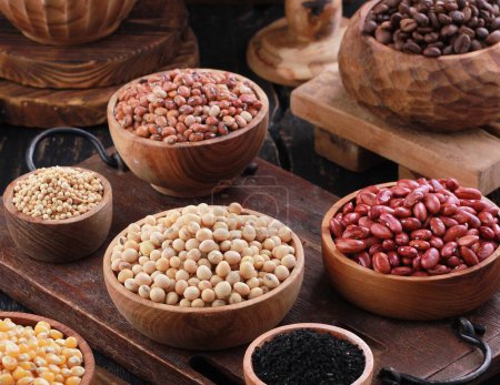 Photo for Different kinds, nuts, beans and grains in bowls - Royalty Free Image